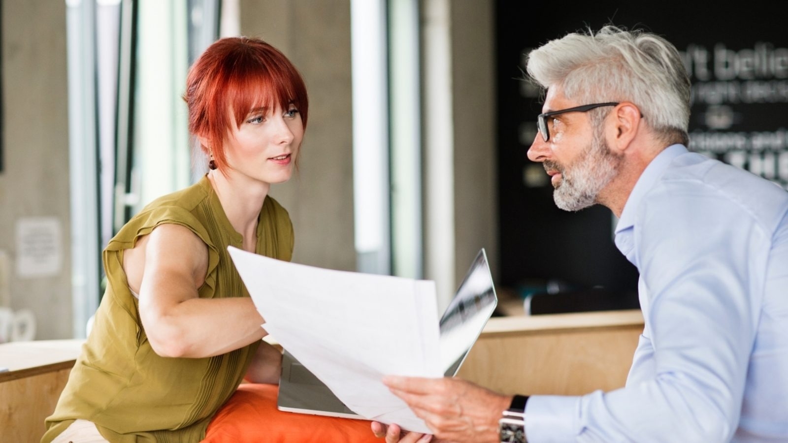 imgi_2_business-people-in-creative-office-consulting-a-P48WVT9-1600x900